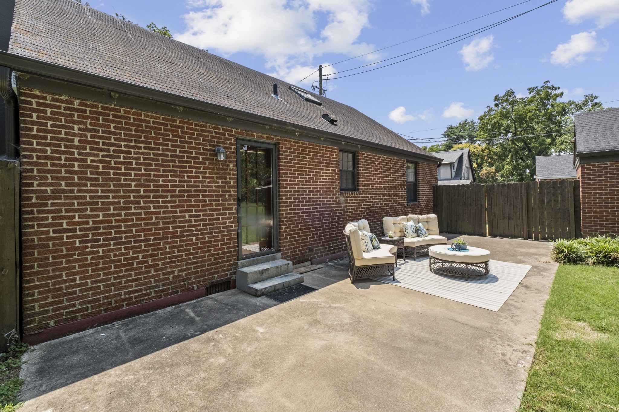 3910 Valley Road Nashville, TN 37205 - Photo 24 of 41 a backyard of a house with fire pit and furniture