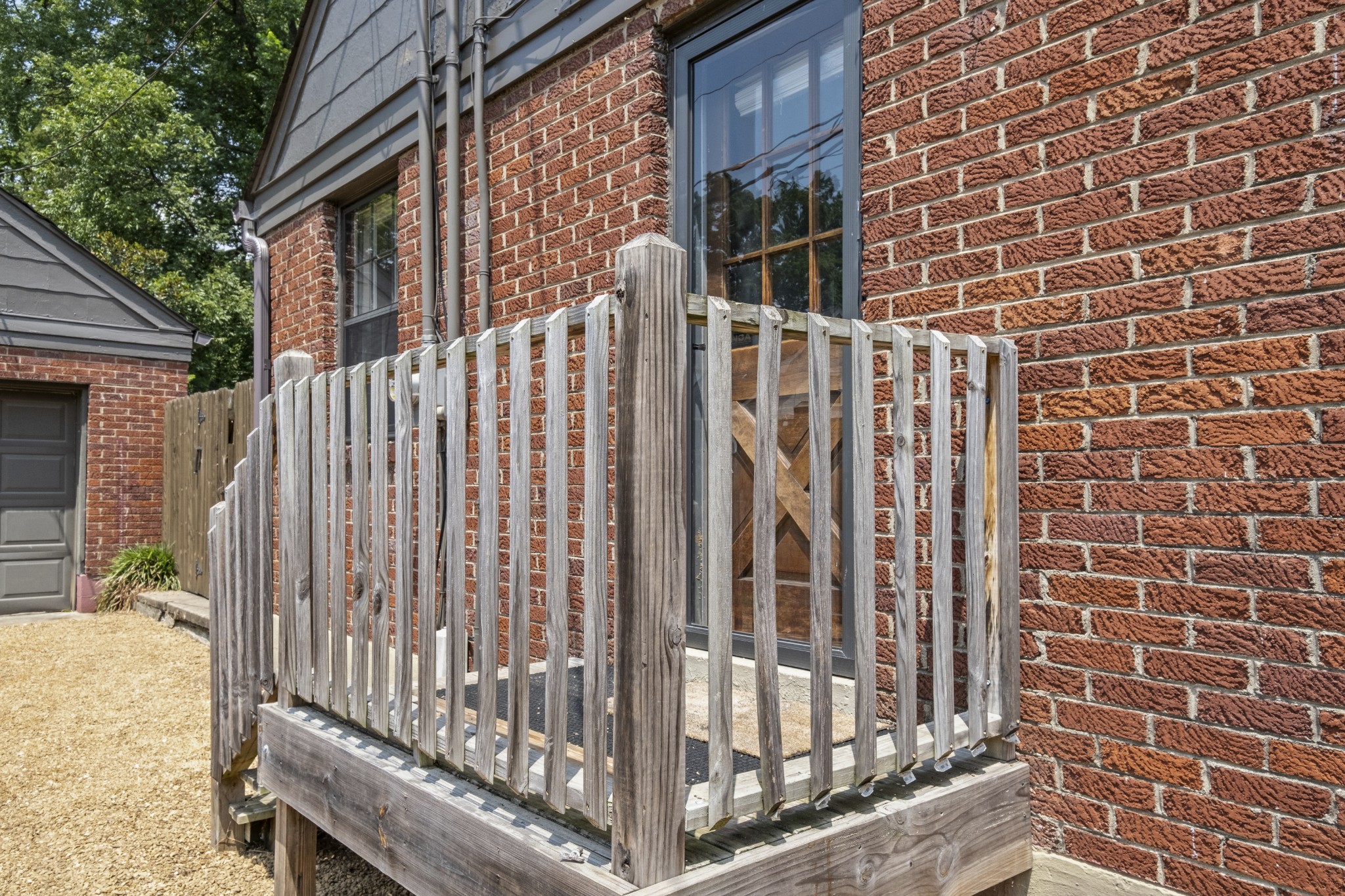 3910 Valley Road Nashville, TN 37205 - Photo 32 of 41 a view of a building with wooden fence
