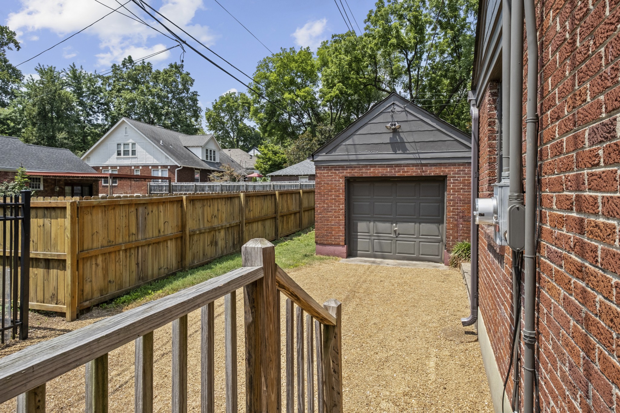 3910 Valley Road Nashville, TN 37205 - Photo 33 of 41 a view of wooden house with a small yard and a large tree