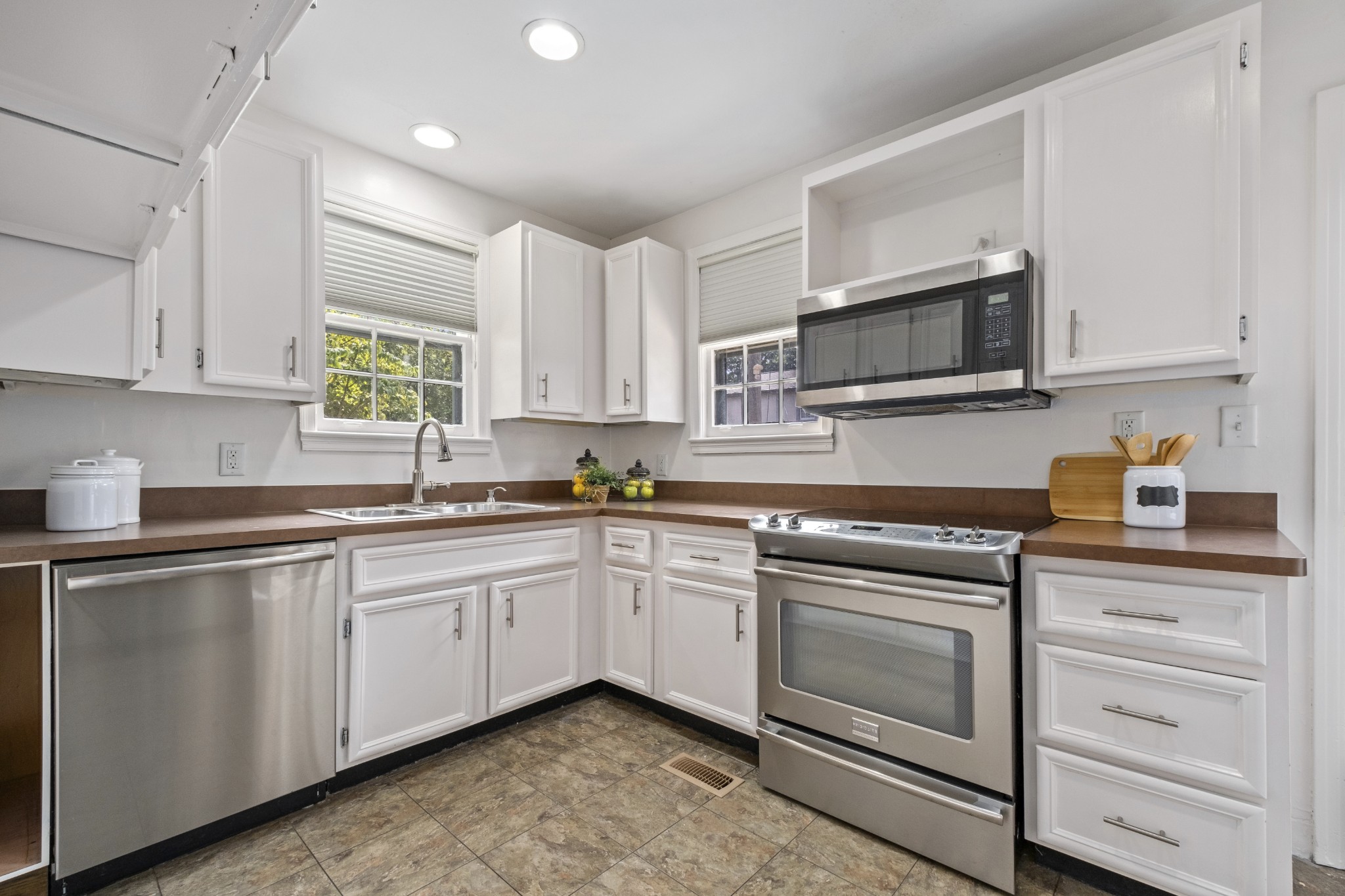 3910 Valley Road Nashville, TN 37205 - Photo 9 of 41 a kitchen with cabinets stainless steel appliances and window
