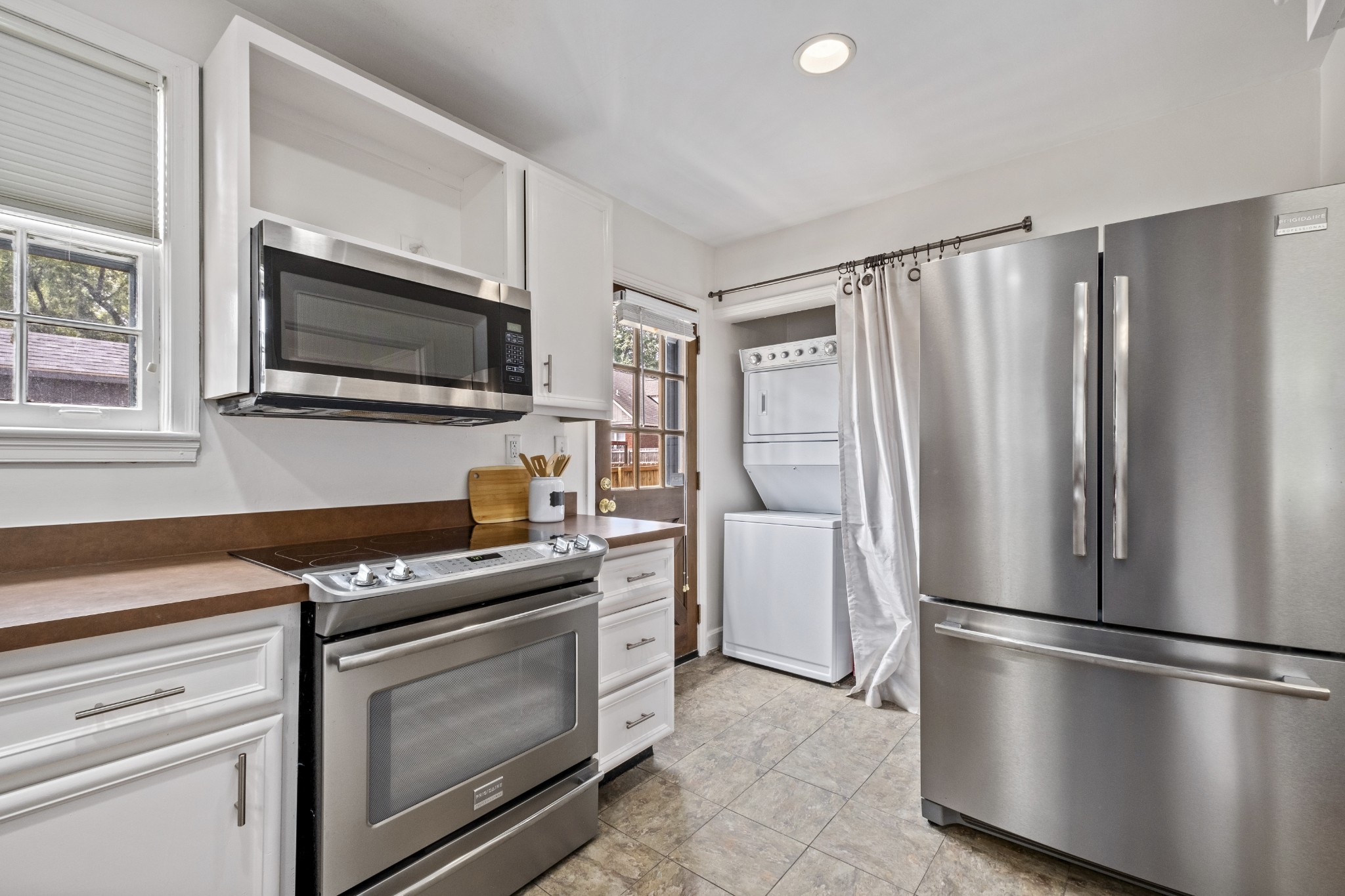 3910 Valley Road Nashville, TN 37205 - Photo 10 of 41 a kitchen with stainless steel appliances a refrigerator stove and microwave
