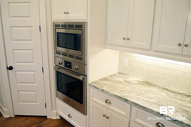 8647 Daintree Court Daphne, AL 36526 - Photo 17 of 29 Kitchen to pantry