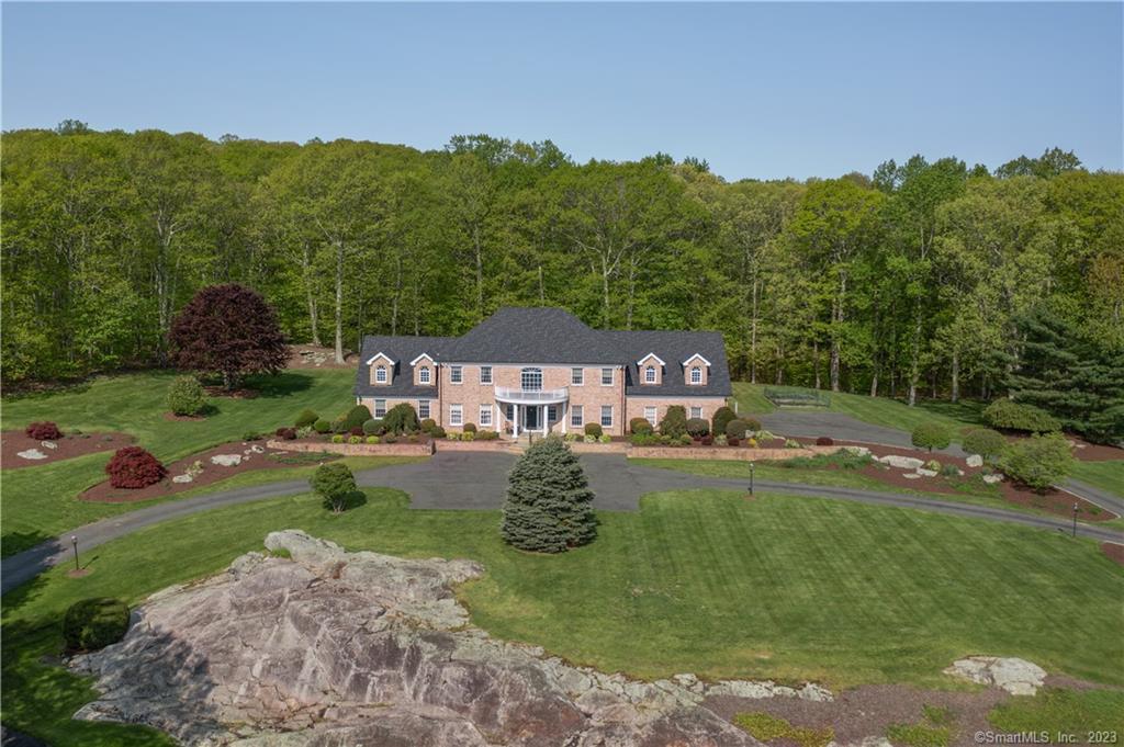 145 Dorman Road Oxford, CT 06478 - Photo 1 of 1 a view of a house with a big yard