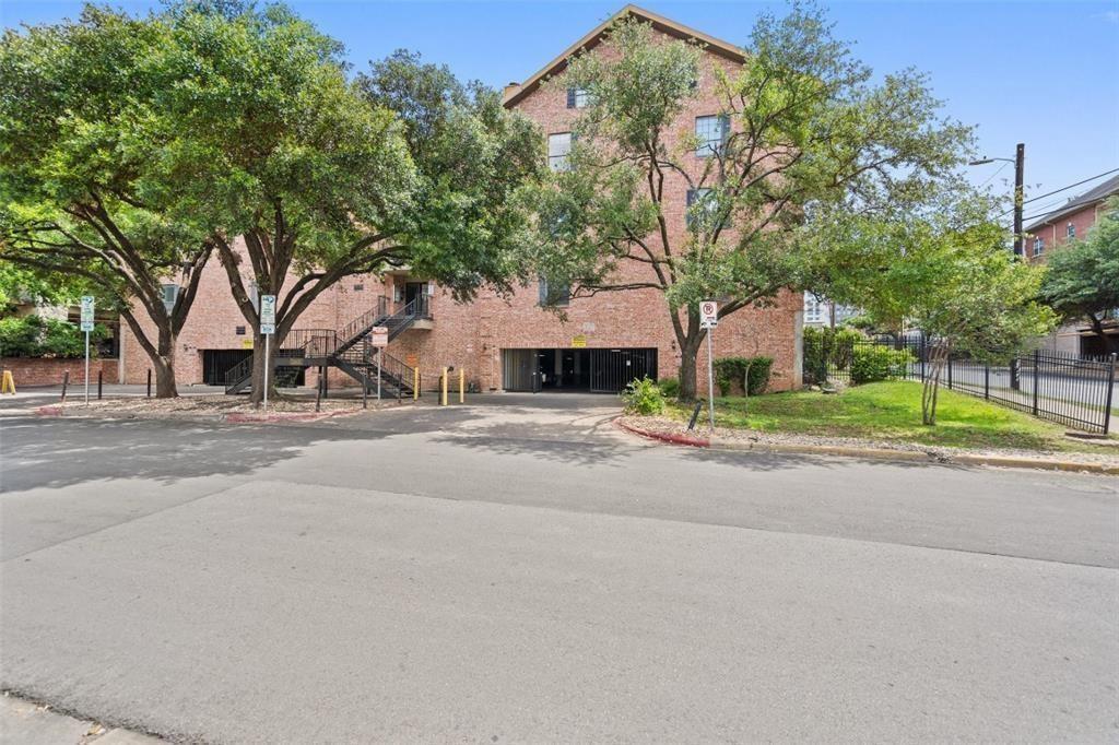 2401 Leon Street, Unit 201 Austin, TX 78705 - Photo 13 of 13 a view of road with yard and trees