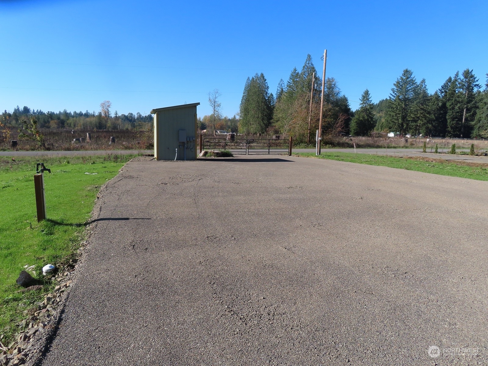 1581 Spencer Road North Onalaska, WA 98570 - Photo 3 of 18 a view of a road with a building in the background