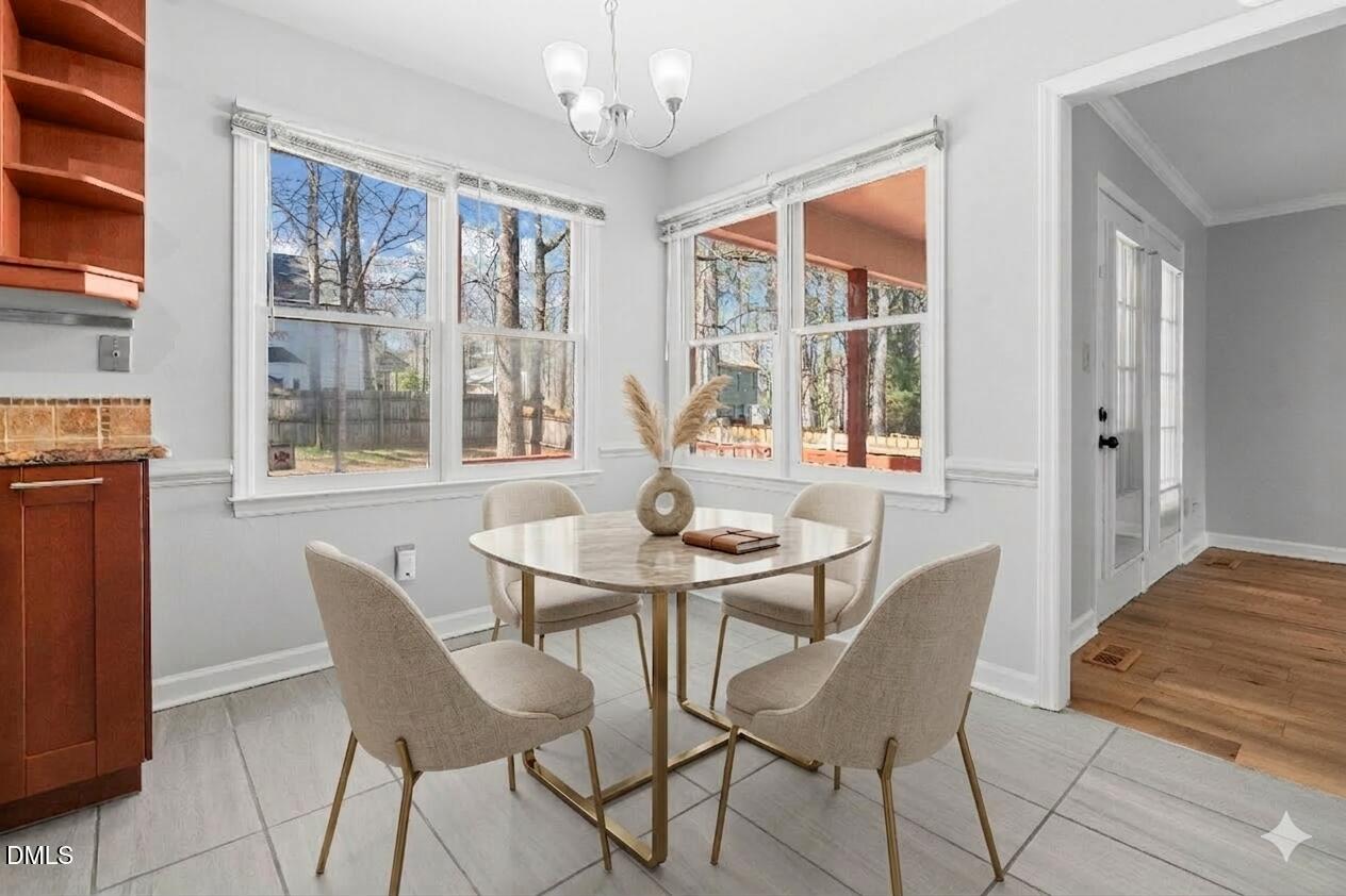 2713 Moorsfield Court Raleigh, NC 27604 - Photo 7 of 46 Virtually Staged Breakfast Area