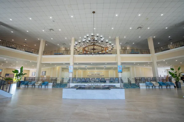a kitchen with stainless steel appliances kitchen island granite countertop a sink and cabinets
