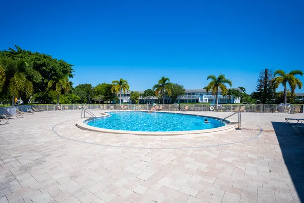 a view of an outdoor space and basketball court