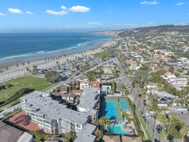 an aerial view of beach and ocean