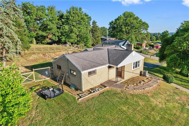 618 Whistler Drive Rochester, PA 15074 - Photo 4 of 29 an aerial view of a house with swimming pool and big yard