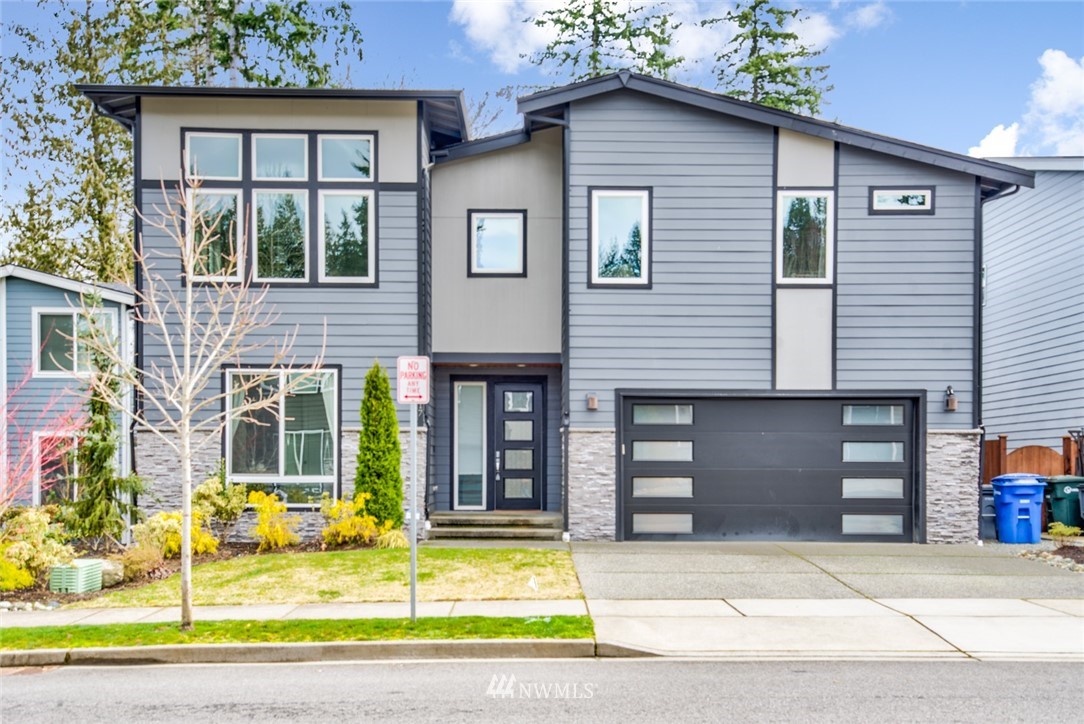 23417 26th Avenue Southeast Bothell, WA 98021 - Photo 1 of 40 a view of house with a swimming pool