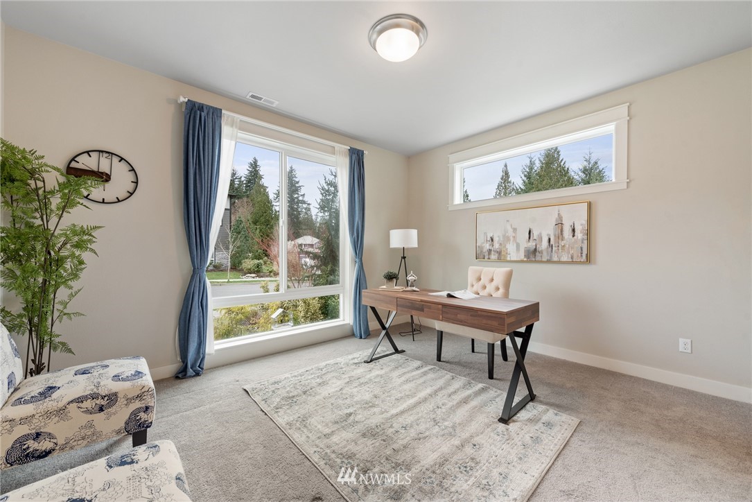 23417 26th Avenue Southeast Bothell, WA 98021 - Photo 18 of 40 a work room with furniture and a window