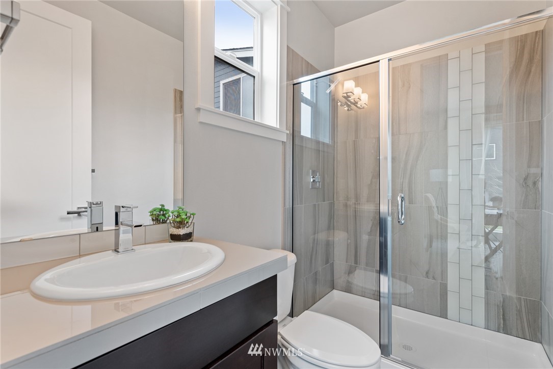 23417 26th Avenue Southeast Bothell, WA 98021 - Photo 20 of 40 a bathroom with a sink and a mirror