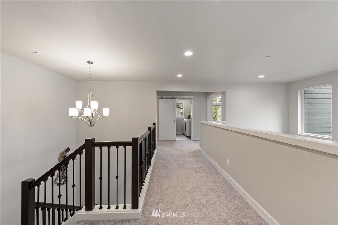 23417 26th Avenue Southeast Bothell, WA 98021 - Photo 22 of 40 a view of a hallway with window