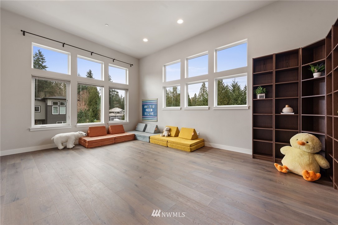 23417 26th Avenue Southeast Bothell, WA 98021 - Photo 33 of 40 a room with furniture toys and a large window