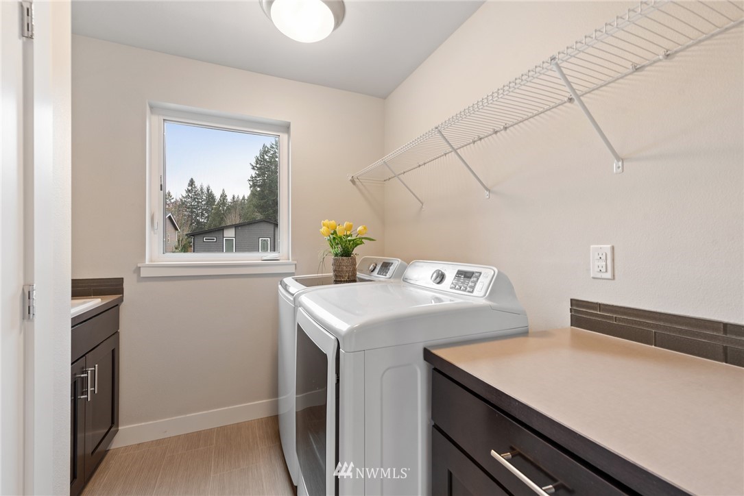 23417 26th Avenue Southeast Bothell, WA 98021 - Photo 36 of 40 a utility room with dryer and washer