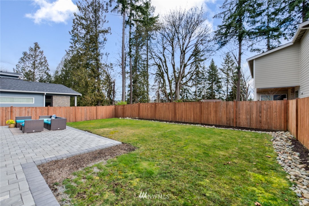 23417 26th Avenue Southeast Bothell, WA 98021 - Photo 38 of 40 a view of a house with backyard and a tree