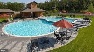 49 Adobe Way Hazleton, PA 18202 - Photo 3 of 10 an outdoor space with furniture and umbrella