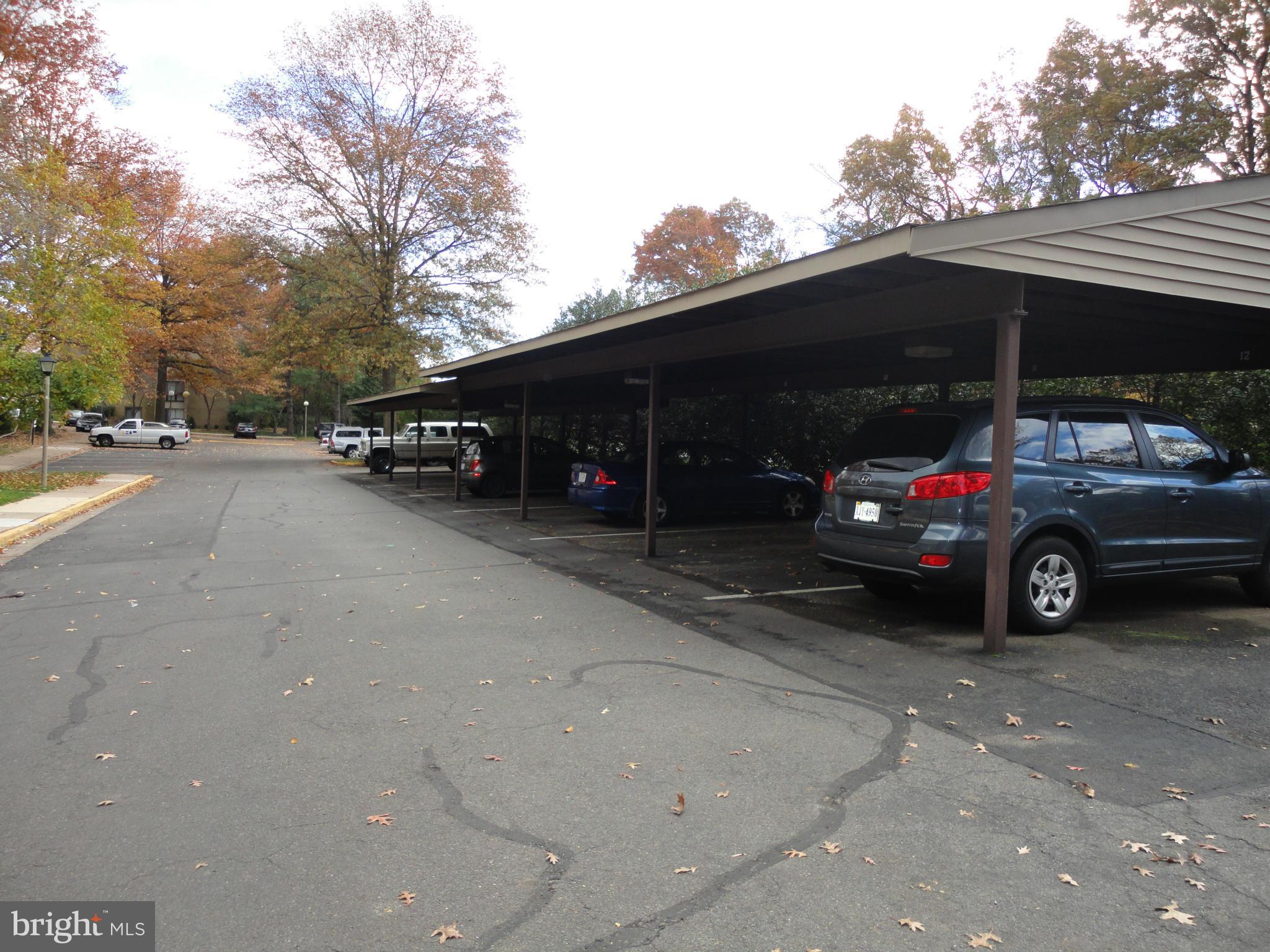 11620 Ivystone Court, Unit 101 Reston, VA 20191 - Photo 20 of 20 a view of a cars parked in front of a house