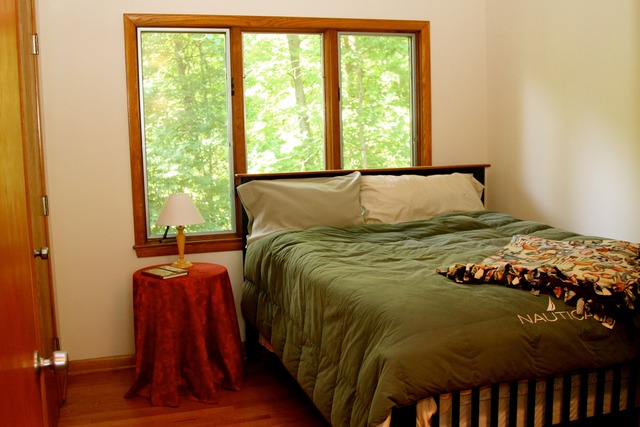 35W281 Country School Road Algonquin, IL 60102 - Photo 14 of 24 a bed sitting in a bedroom next to a window