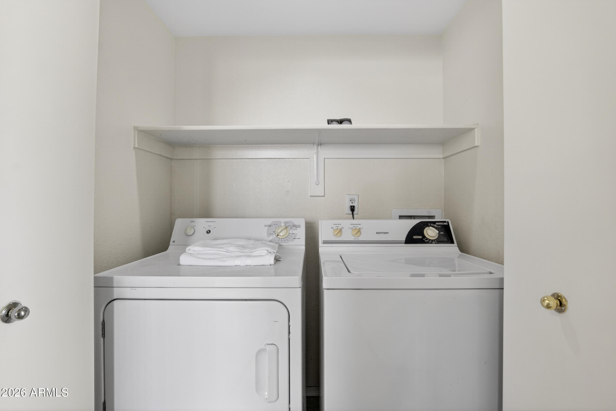 2134 East Broadway Road, Unit 1042 Tempe, AZ 85282 - Photo 23 of 33 a utility room with dryer and washer