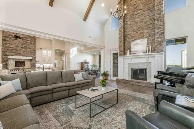 a kitchen with stainless steel appliances granite countertop a stove and cabinets