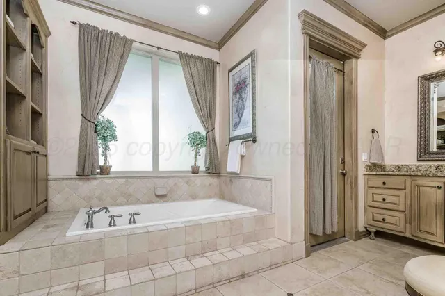 a bathroom with a toilet sink and shower