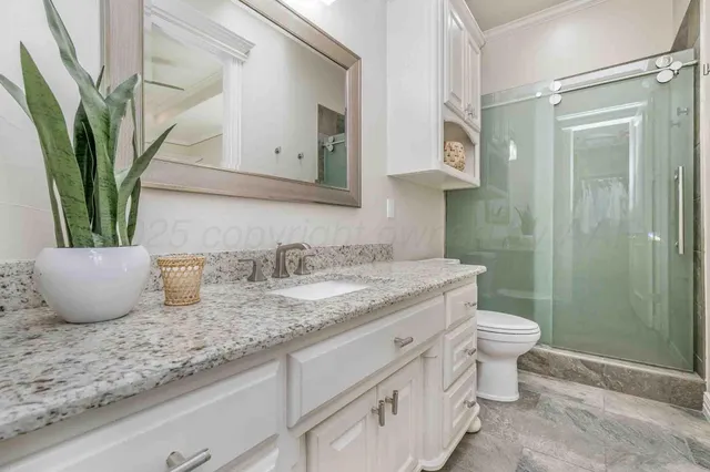 a view of a backyard with furniture and a tub