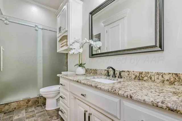 a living room with furniture a rug and a table