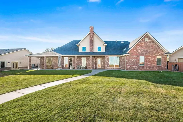 a view of workspace with furniture and window