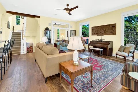 a view of a dining room with furniture window and wooden floor