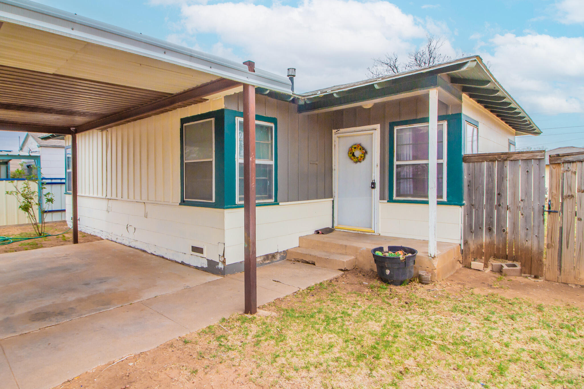 a front view of a house with snow