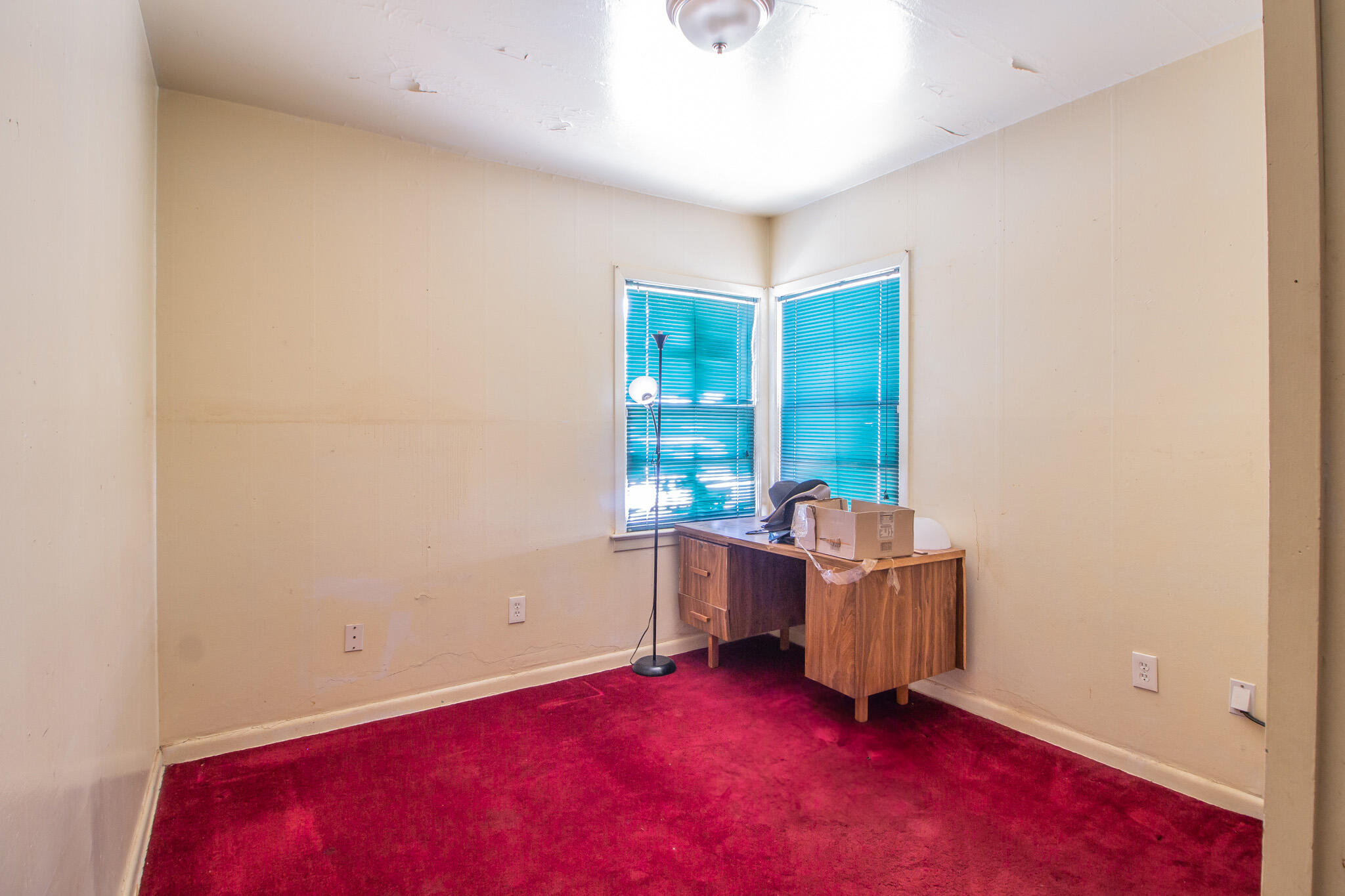 3215 Itasca Street Lubbock, TX 79415 - Photo 12 of 20 an empty room with windows and closet