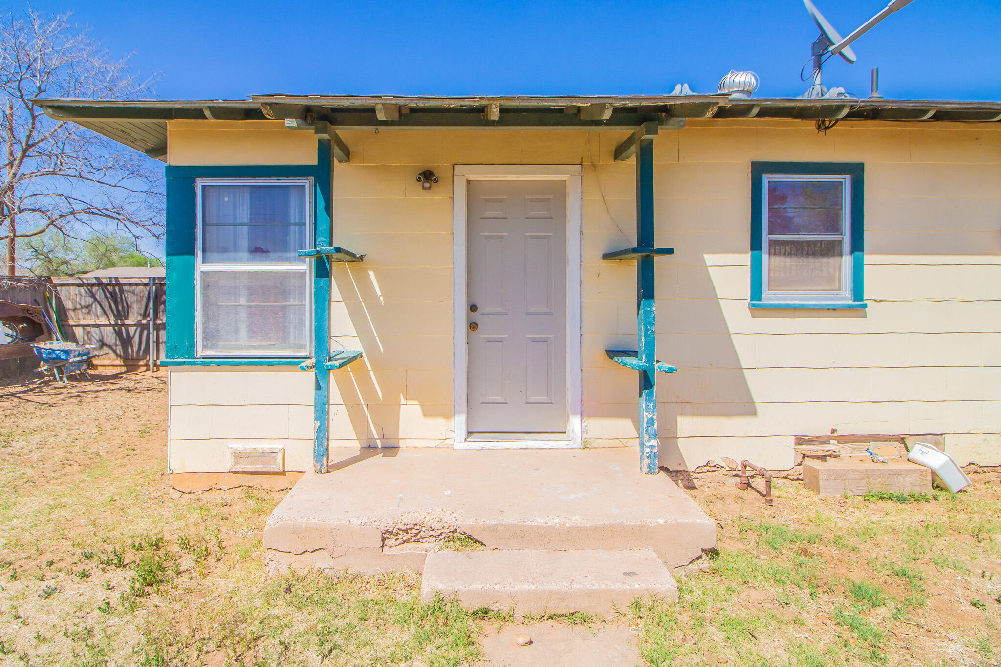 3215 Itasca Street Lubbock, TX 79415 - Photo 15 of 20 a view of a house with wooden fence