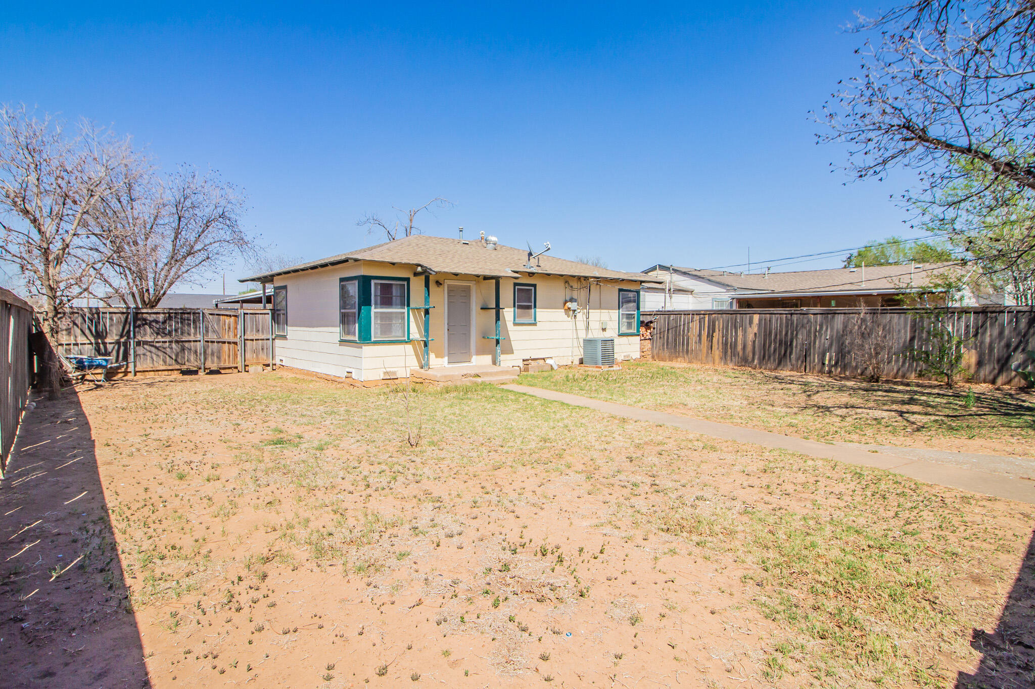 3215 Itasca Street Lubbock, TX 79415 - Photo 16 of 20 a large house with a large tree in front of it