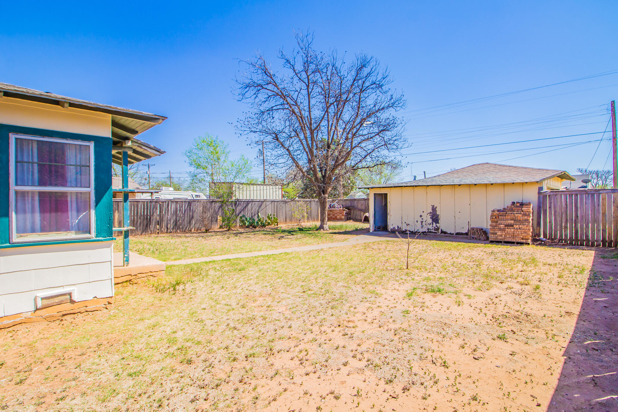 3215 Itasca Street Lubbock, TX 79415 - Photo 18 of 20 a swimming pool with yard and outdoor seating