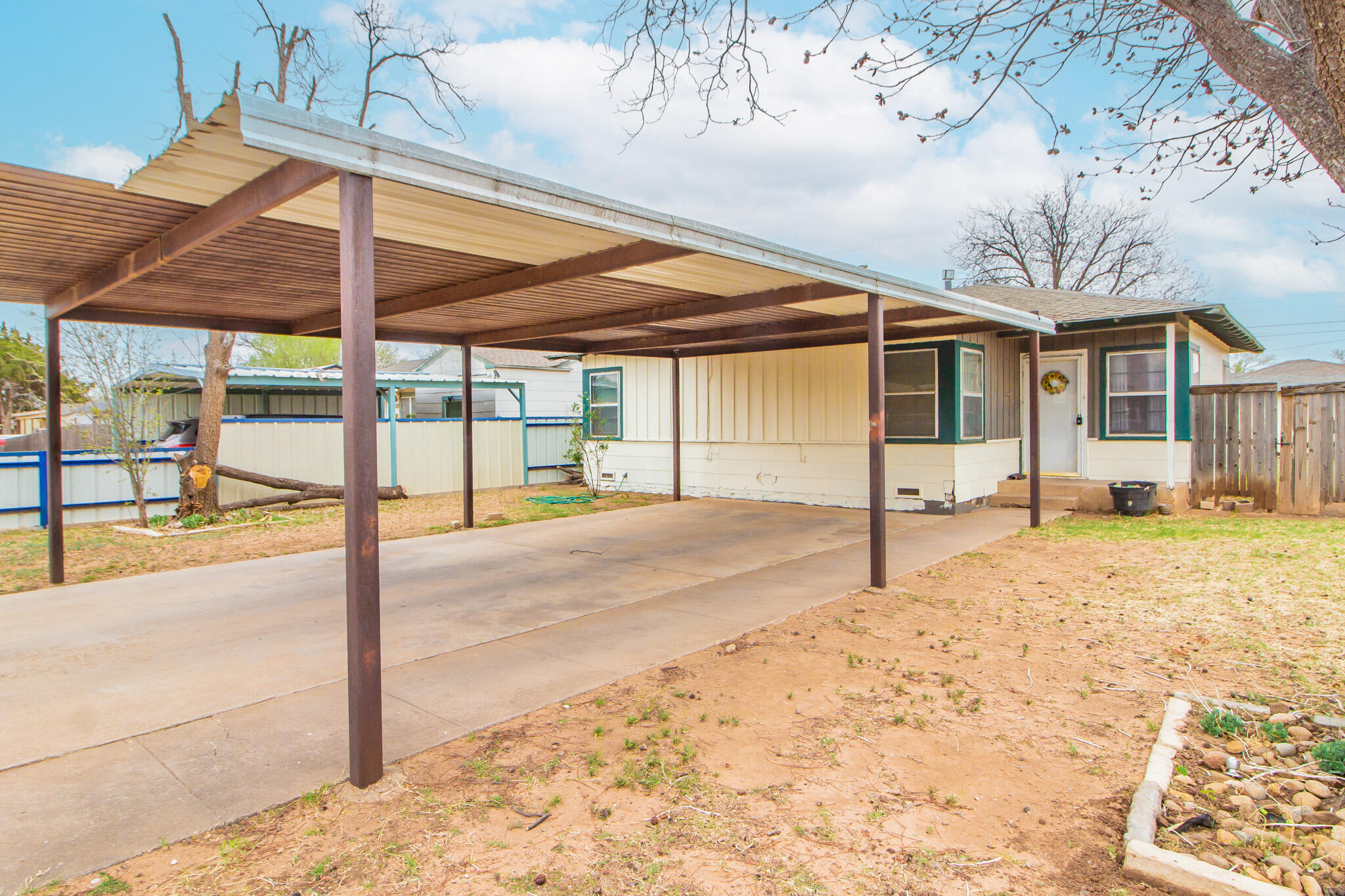 3215 Itasca Street Lubbock, TX 79415 - Photo 2 of 20 a view of a house with a backyard