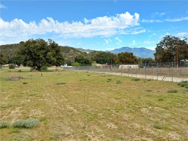 a view of lake with sunset