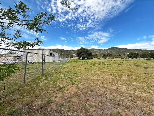a view of an outdoor space and mountains