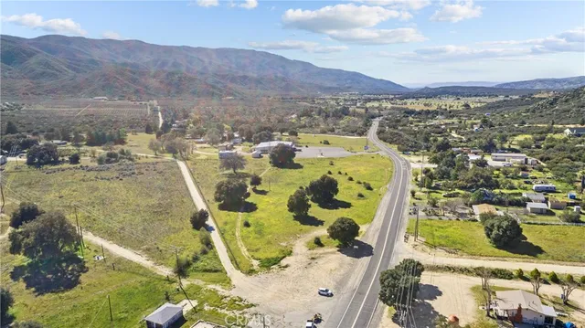 a view of an swimming pool with a yard