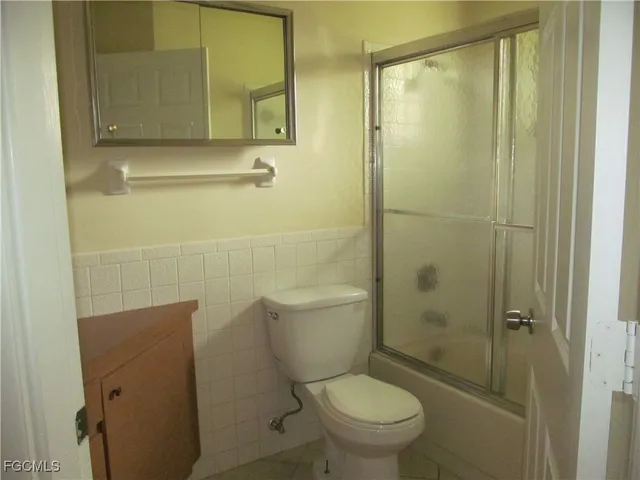 a kitchen with a stove and a sink