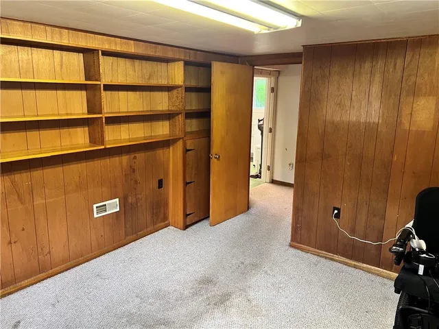 a view of front of house with a yard