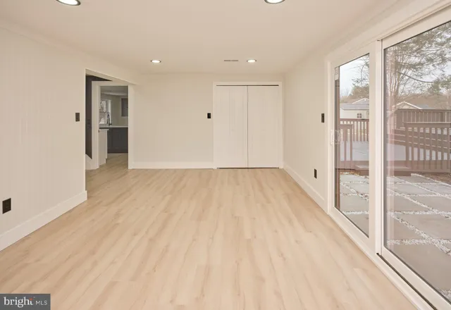 a kitchen with stainless steel appliances a refrigerator sink and stove