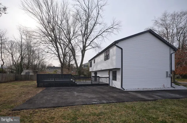 a view of a house with a back yard