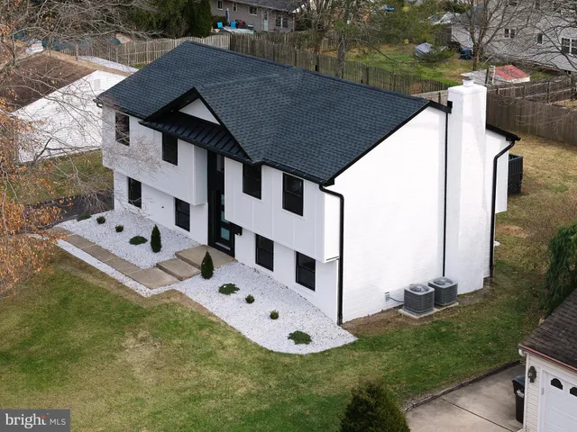 an aerial view of a city with lots of residential buildings