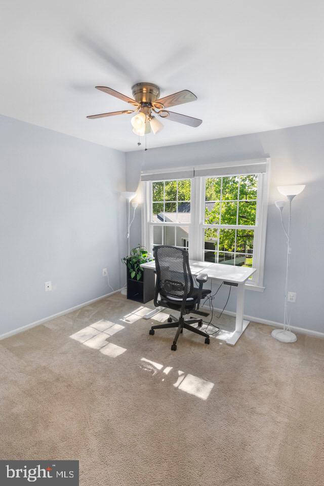 13338 Point Rider Lane Herndon, VA 20171 - Photo 24 of 36 a view of a workspace with furniture and a window