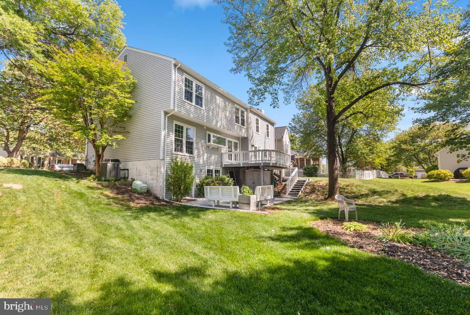 13338 Point Rider Lane Herndon, VA 20171 - Photo 35 of 36 a view of backyard of house with green space