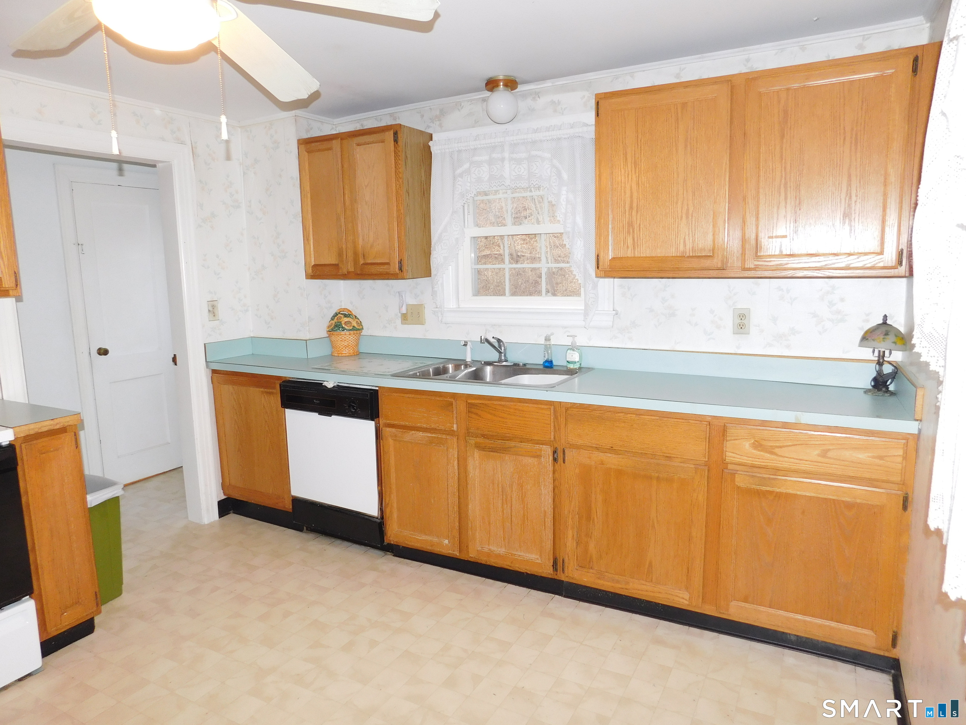 60 E Street Derby, CT 06418 - Photo 13 of 31 a bathroom with a sink mirror and a bathtub