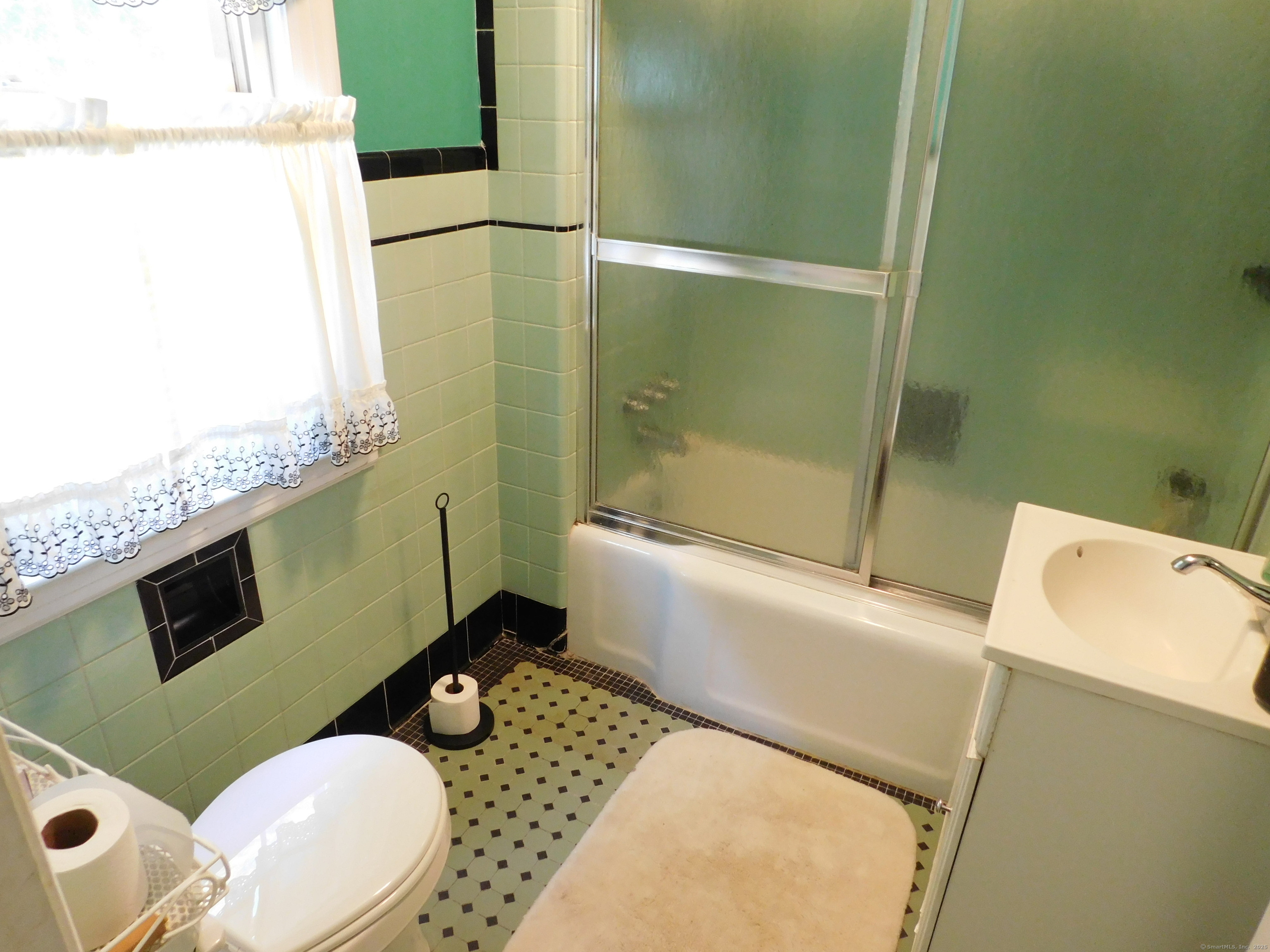 60 E Street Derby, CT 06418 - Photo 19 of 31 a bathroom with a toilet sink and mirror