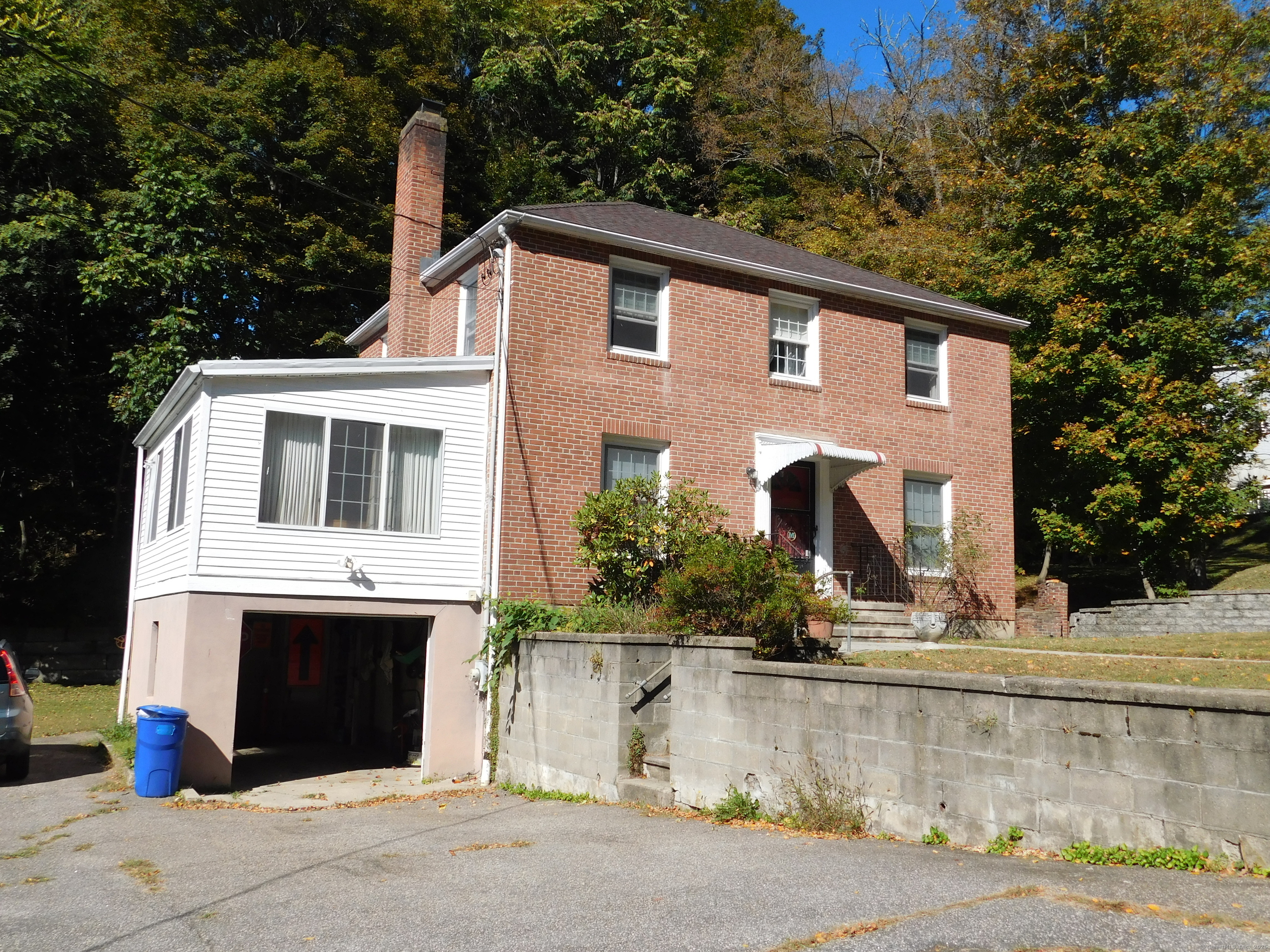 60 E Street Derby, CT 06418 - Photo 2 of 31 a view of a white house with large windows